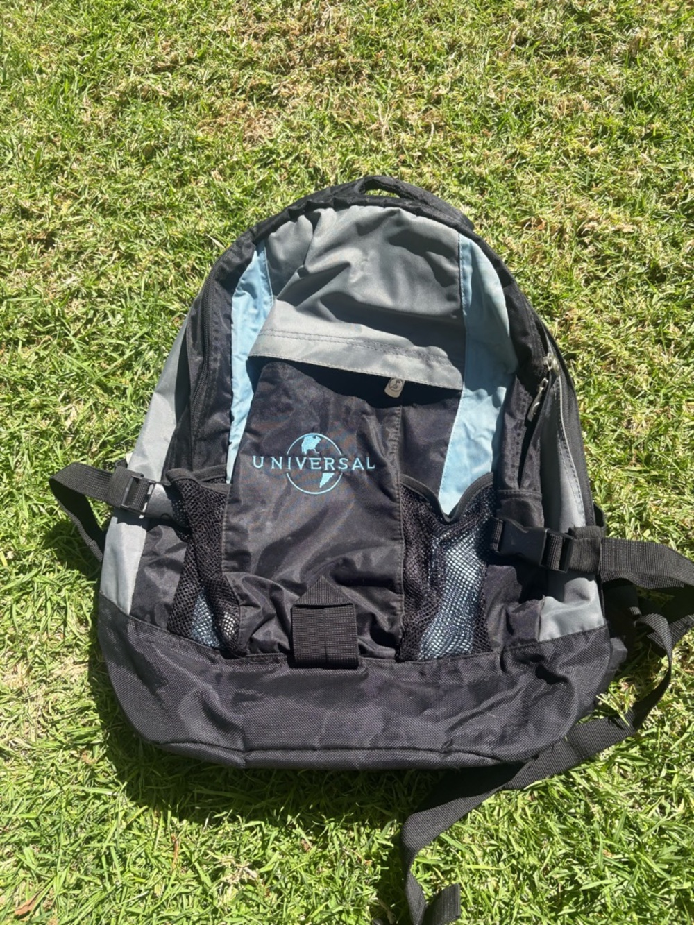 Universal Black, Gray and Light Blue Backpack with Mesh Front Pockets